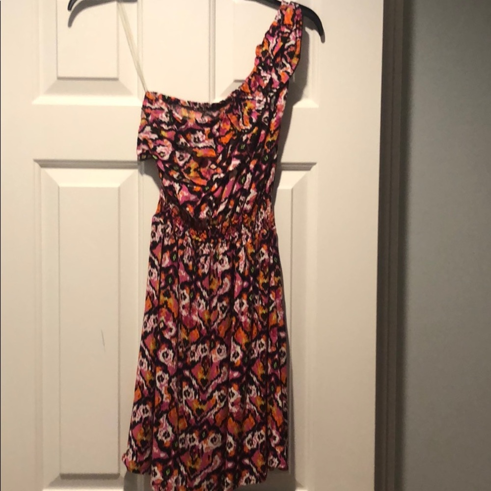 One shoulder floral dress.